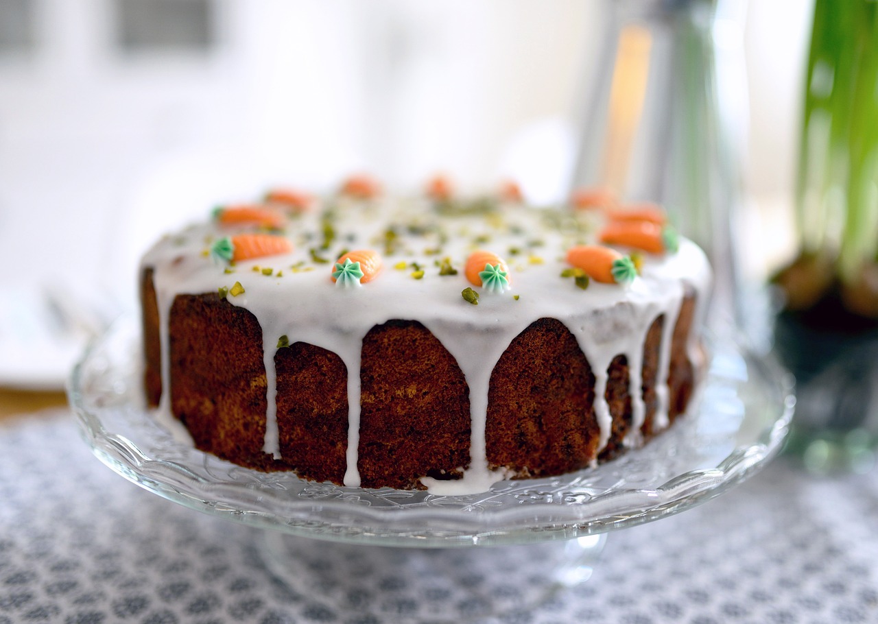 A cake on a metal decorating turntable